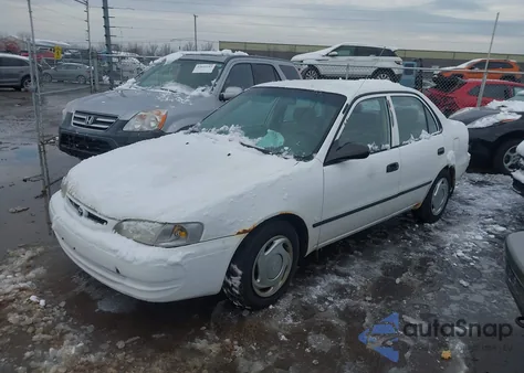 1999 Toyota Corolla Ce z USA, uszkodzony, nr VIN 1NXBR12E5XZ150357